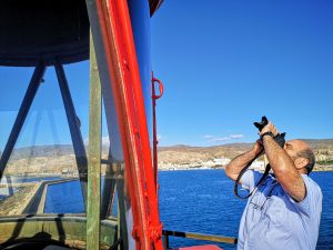 Fotografiando la linterna del Faro de Poniente, en el Puerto de Almería