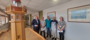 Los nuevos fareros, con el presidente de la Autoridad Portuaria